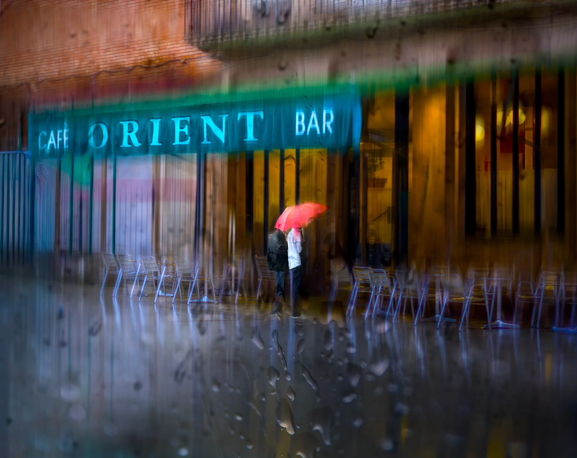 Rainy Night at Cafe Orient — general photo by dolo, scored 7.2/10 by REVIEWR's AI critique