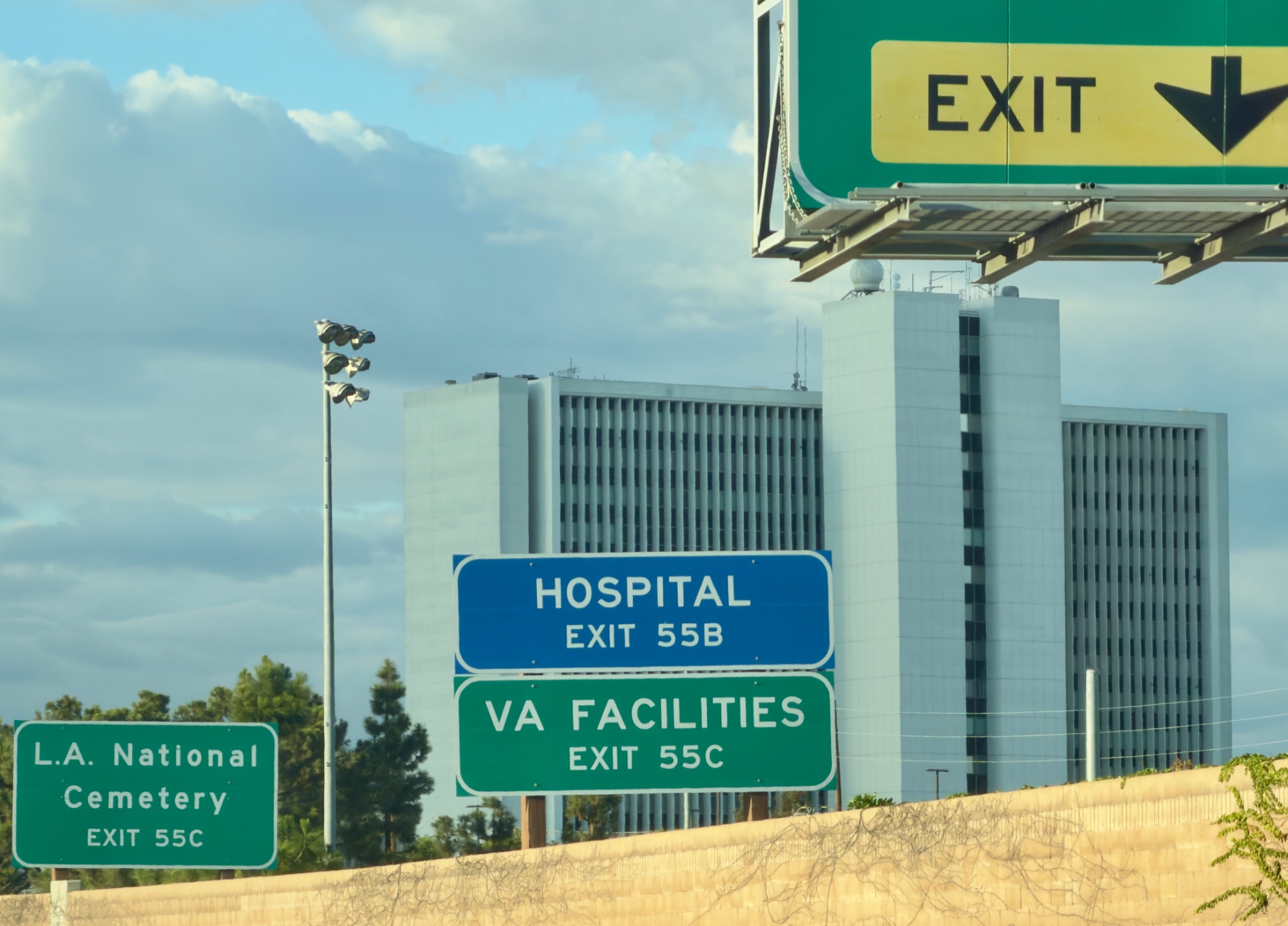 Highway Exits — street photo by Les Zackler, scored 4.3/10 by REVIEWR's AI critique