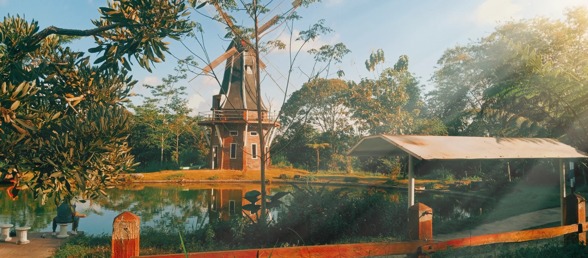 Windmill by the Pond — landscape photo by Chandra, scored 6.0/10 by REVIEWR's AI critique